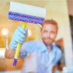 Window Cleaner Cleaning the Window